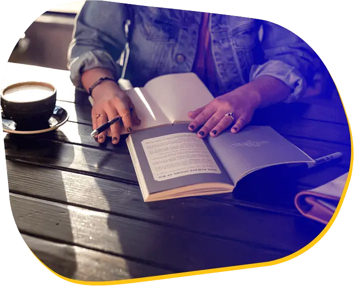 Author writing a book and representing Book Writing House